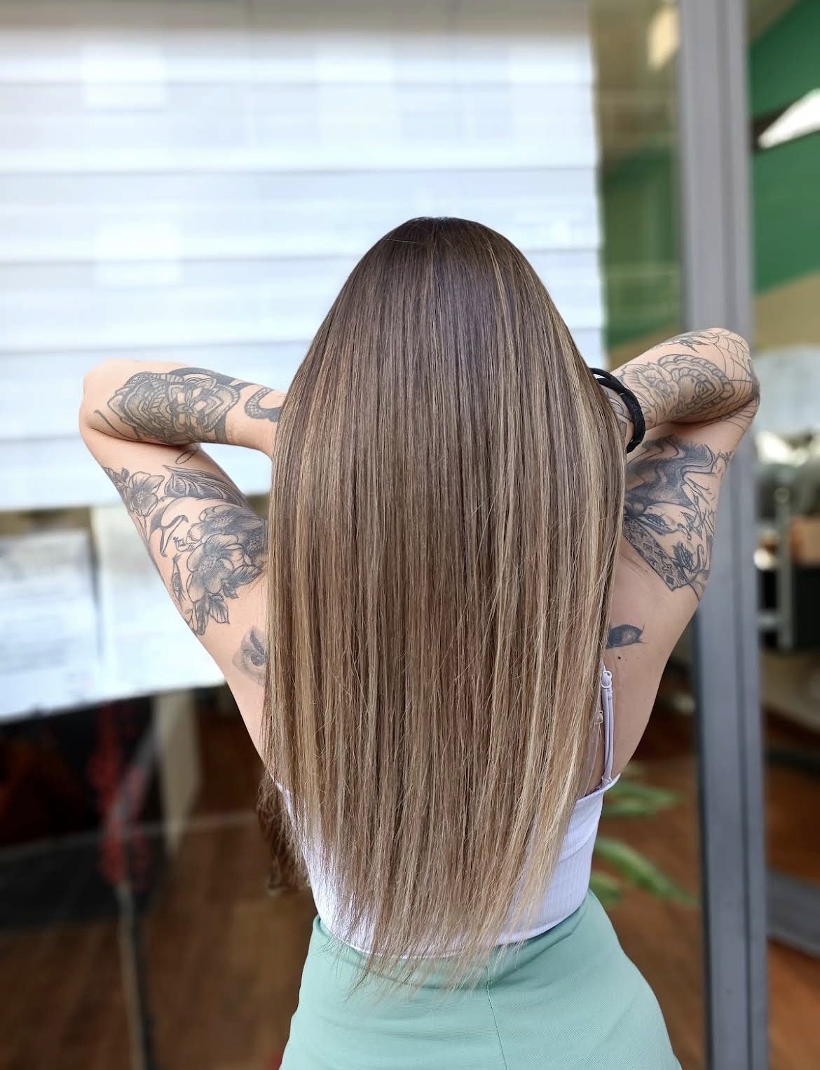 Balayage miele su capelli lisci raccolti